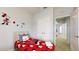 Charming bedroom featuring a Mickey Mouse theme, perfect for a  at 2411 Caravelle Cir, Kissimmee, FL 34746