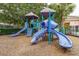 Colorful community playground featuring slides and climbing structures for enjoyment at 2411 Caravelle Cir, Kissimmee, FL 34746