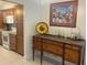 Kitchen area with wooden cabinets, stainless steel appliances, and granite countertops for a modern touch at 2426 Windward Way, Winter Park, FL 32792