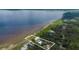 Aerial view showcasing the property's prime waterfront location and scenic beauty at 2518 Fort Lane Rd, Geneva, FL 32732