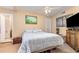 Inviting bedroom with neutral tones, decorative artwork, and a comfortable bed at 2518 Fort Lane Rd, Geneva, FL 32732