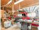 Spacious garage with work area, tools, and equipment, perfect for DIY projects and storage at 2518 Fort Lane Rd, Geneva, FL 32732