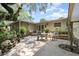 Relax on the beautiful stone patio overlooking the well maintained yard and garden at 2518 Fort Lane Rd, Geneva, FL 32732