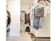 Walk-in closet with organized storage for clothes and accessories at 2668 Grand Central Ave, Tavares, FL 32778