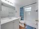 Clean bathroom with a single vanity, a toilet, and a shower-tub combo, providing a functional space at 2729 N Poinciana Blvd # 125, Kissimmee, FL 34746