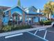 Community clubhouse boasts charming architecture, manicured landscaping and convenient accessible parking at 2729 N Poinciana Blvd # 125, Kissimmee, FL 34746