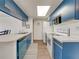 Efficient kitchen layout with bright lighting and standard appliances is perfect for cooking at 2729 N Poinciana Blvd # 125, Kissimmee, FL 34746