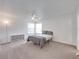 Spacious main bedroom with large windows, plush carpet, and ample space for relaxation at 2729 N Poinciana Blvd # 125, Kissimmee, FL 34746