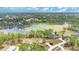 A high aerial view of a neighborhood and the lake at 2772 Pelham Cir, Deltona, FL 32738