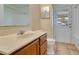 Bathroom featuring a vanity with a cream countertop and a toilet at 2772 Pelham Cir, Deltona, FL 32738
