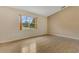 Bright bedroom featuring a large window, hardwood floors and neutral walls for a serene and comfortable space at 2772 Pelham Cir, Deltona, FL 32738