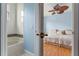Bedroom and bathroom connected by open doorway at 2828 Northampton Ave, Orlando, FL 32828
