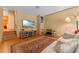 Cozy living room with a comfortable sofa, stylish decor, and an entertainment center at 2828 Northampton Ave, Orlando, FL 32828