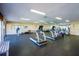 Well-equipped fitness center with treadmills, exercise machines, and rubber flooring for a great workout at 2930 S Semoran Blvd # 408, Orlando, FL 32822