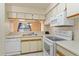 Practical kitchen with essential appliances and convenient layout at 2930 S Semoran Blvd # 408, Orlando, FL 32822