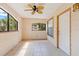 The spacious patio is brightly lit with a ceiling fan and tiled flooring at 2930 S Semoran Blvd # 408, Orlando, FL 32822