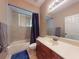 Clean bathroom with bathtub, shower, and sink with vanity at 3216 Rolling Hills Ln, Apopka, FL 32712