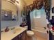 Themed bathroom with ornate decor, unique fixtures, and dramatic accents at 3216 Rolling Hills Ln, Apopka, FL 32712