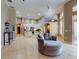 Open living room with tile flooring, open layout, and natural lighting at 3216 Rolling Hills Ln, Apopka, FL 32712