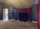 Theater room featuring a large screen, comfortable seating, and movie-themed decor at 3216 Rolling Hills Ln, Apopka, FL 32712