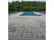 Relaxing community pool surrounded by plenty of lounge chairs at 3316 Bellissimo Ave, Kissimmee, FL 34746