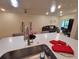 Bright and spacious kitchen overlooking the living area, featuring recessed lighting at 3316 Bellissimo Ave, Kissimmee, FL 34746