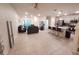 Open-concept floor plan combining kitchen and living area, perfect for modern living and entertaining at 3316 Bellissimo Ave, Kissimmee, FL 34746