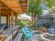 Backyard retreat featuring a custom outdoor kitchen and fire pit with cozy seating, ideal for entertaining and outdoor relaxation at 3443 Arnel Dr, Winter Park, FL 32792