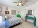 Comfortable bedroom with decor, wood floors, a ceiling fan, and bright natural light at 3443 Arnel Dr, Winter Park, FL 32792
