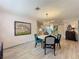 Dining room showcases chandelier, art, and view into other rooms at 3443 Arnel Dr, Winter Park, FL 32792
