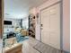 Inviting foyer view into living room with stylish decor and lots of natural light at 3443 Arnel Dr, Winter Park, FL 32792