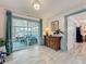 Inviting living area with natural light and access to screened in porch at 3443 Arnel Dr, Winter Park, FL 32792