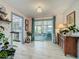 Inviting living area with natural light and access to screened in porch at 3443 Arnel Dr, Winter Park, FL 32792