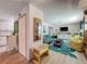 Cozy living room with stylish decor, comfortable seating, and bright, natural light at 3443 Arnel Dr, Winter Park, FL 32792
