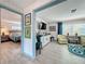 Open living room featuring hardwood floors and stylish furnishings at 3443 Arnel Dr, Winter Park, FL 32792