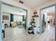Open-concept living space with hardwood floors, natural light and stainless steel appliances at 3443 Arnel Dr, Winter Park, FL 32792