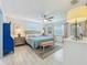 The main bedroom features a ceiling fan, light colored walls, and wood floors at 3443 Arnel Dr, Winter Park, FL 32792