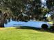 Lush backyard and lake views on a sunny day at 510 Cranes Way # 302, Altamonte Springs, FL 32701