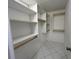 Walk-in closet features rod and shelf storage for optimal organization at 510 Cranes Way # 302, Altamonte Springs, FL 32701