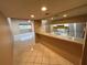 Open concept kitchen with a breakfast bar, white cabinets, and stainless-steel appliances at 510 Cranes Way # 302, Altamonte Springs, FL 32701