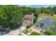 Stunning aerial view of the property showcasing the well-manicured lawns and neighborhood at 5113 Mystic Point Ct, Orlando, FL 32812