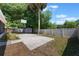 Spacious backyard with basketball court, storage shed, and well-maintained landscaping at 5113 Mystic Point Ct, Orlando, FL 32812