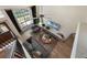 Bright living room featuring high ceilings, a ceiling fan, and a cozy seating arrangement at 5113 Mystic Point Ct, Orlando, FL 32812