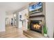Open concept floor plan showcases a fireplace that flows into the living room and kitchen at 5113 Mystic Point Ct, Orlando, FL 32812