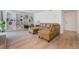 Spacious living room with built-in shelving, hardwood floors, and neutral tones at 5113 Mystic Point Ct, Orlando, FL 32812