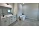 Bright primary bathroom featuring double vanity and a freestanding tub at 529 Marion Oaks Ln, Ocala, FL 34473