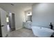 Primary bathroom featuring a soaking tub, vanity, and shower at 529 Marion Oaks Ln, Ocala, FL 34473