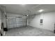 Spacious two-car garage featuring an automatic door opener at 529 Marion Oaks Ln, Ocala, FL 34473