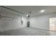 Two-car garage showing water heater and entry to house at 529 Marion Oaks Ln, Ocala, FL 34473