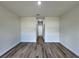 Wood-look laminate hallway leading to other rooms at 529 Marion Oaks Ln, Ocala, FL 34473